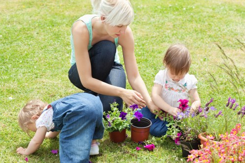 Team maintaining a lush green lawn